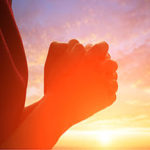 powerful praying clasped hands