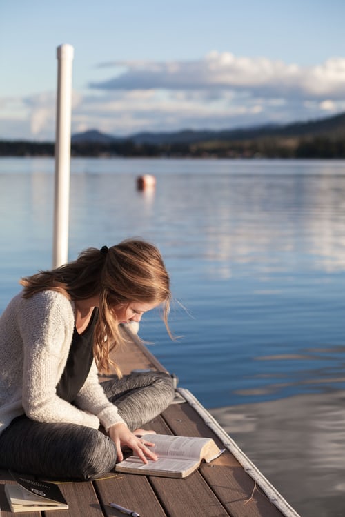 young woman studying the Bible